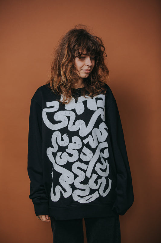 Melns unisex džemperis "Tavas smadzenes ir skaistas"